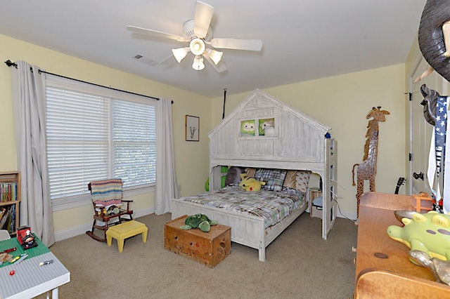 5023 Masters Ln, Columbus, GA 31909 - carpeted bedroom with ceiling fan and baseboards