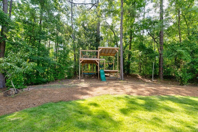 5023 Masters Ln, Columbus, GA 31909 - view of grassy yard with a playground