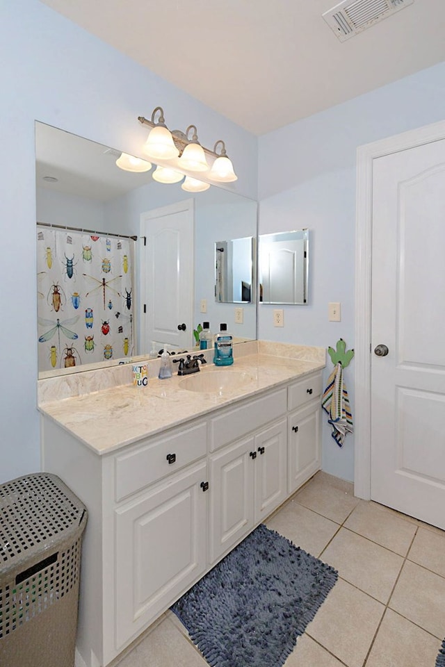 5023 Masters Ln, Columbus, GA 31909 - bathroom featuring vanity and tile patterned floors