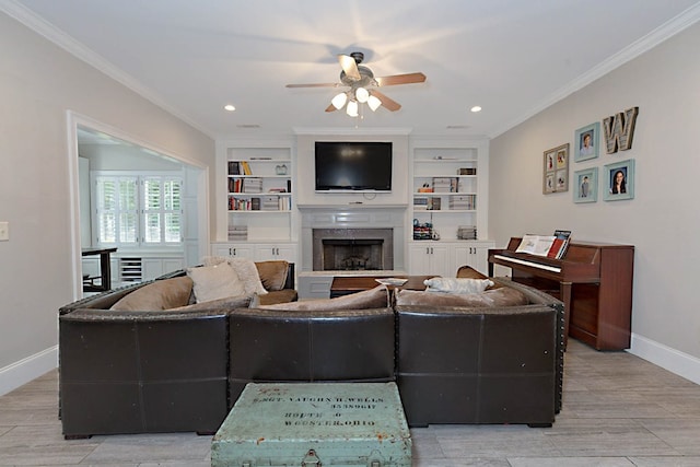 5023 Masters Ln, Columbus, GA 31909 - living area with a ceiling fan, ornamental molding, a fireplace, light wood finished floors, and recessed lighting