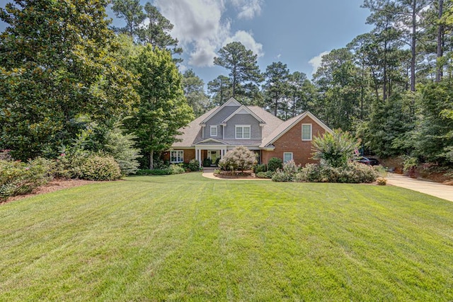 5023 Masters Ln, Columbus, GA 31909 - craftsman-style home with a front yard and brick siding