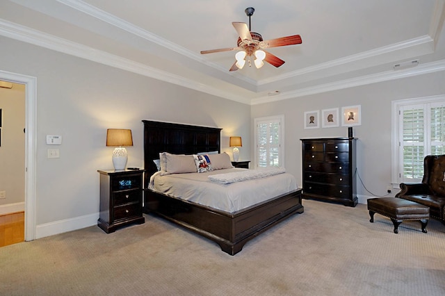 5023 Masters Ln, Columbus, GA 31909 - bedroom featuring a tray ceiling, light carpet, ornamental molding, and ceiling fan