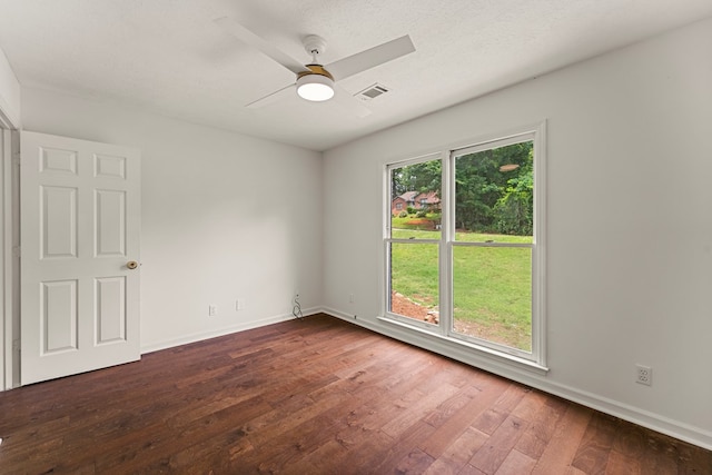 4658 Thoroughbred Ln, Columbus, GA 31909 - empty room with dark wood-style floors, a ceiling fan, and baseboards