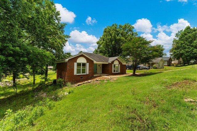 4658 Thoroughbred Ln, Columbus, GA 31909 - ranch-style home featuring a front lawn and brick siding