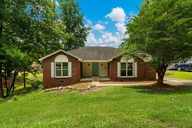 4658 Thoroughbred Ln, Columbus, GA 31909 - single story home featuring a front lawn, brick siding, and roof with shingles