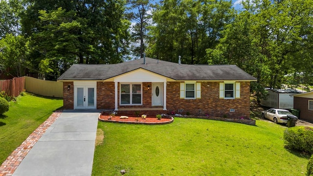 2525 Corineth Dr, Columbus, GA 31907 - view of front of house featuring driveway, brick siding, french doors, and crawl space