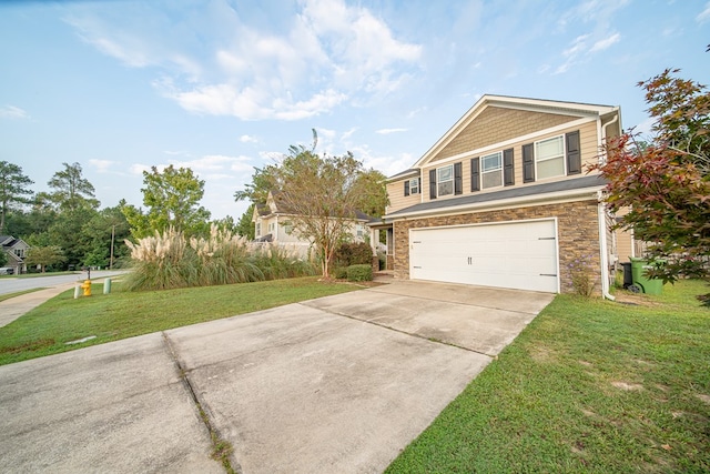 view of front facade featuring a garage and a front lawn