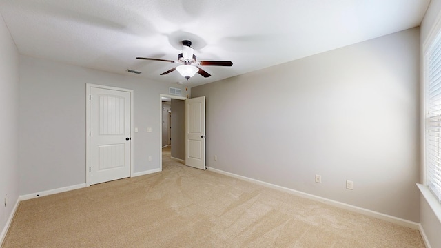 7315 San Vista Dr, Columbus, GA 31909 - spare room featuring light carpet, a ceiling fan, and baseboards