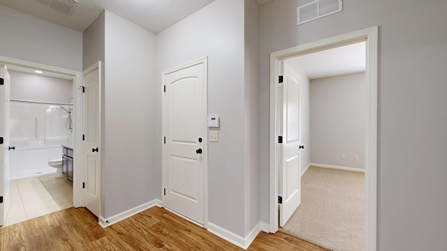 7315 San Vista Dr, Columbus, GA 31909 - hallway with baseboards and light wood finished floors