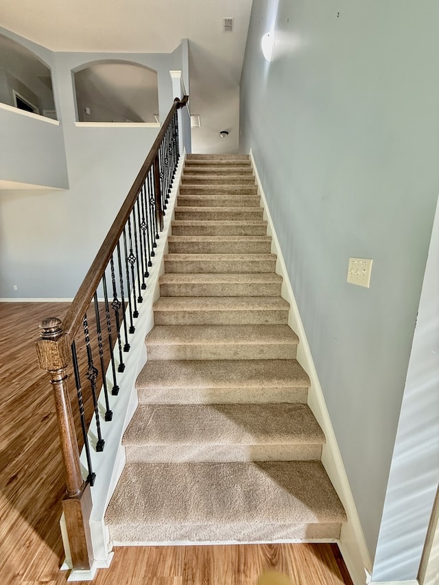 7315 San Vista Dr, Columbus, GA 31909 - staircase featuring wood finished floors and baseboards