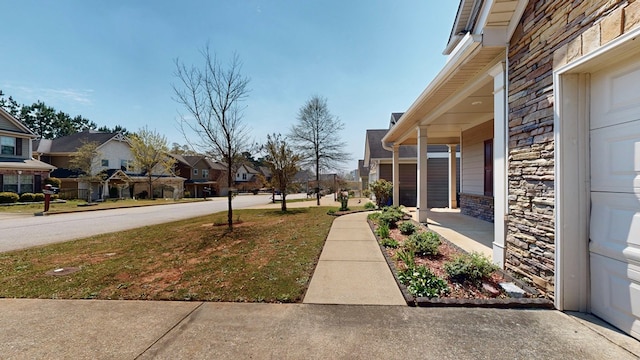 7315 San Vista Dr, Columbus, GA 31909 - view of yard featuring a residential view and a porch