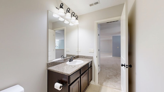 7315 San Vista Dr, Columbus, GA 31909 - bathroom featuring vanity, toilet, and tile patterned floors