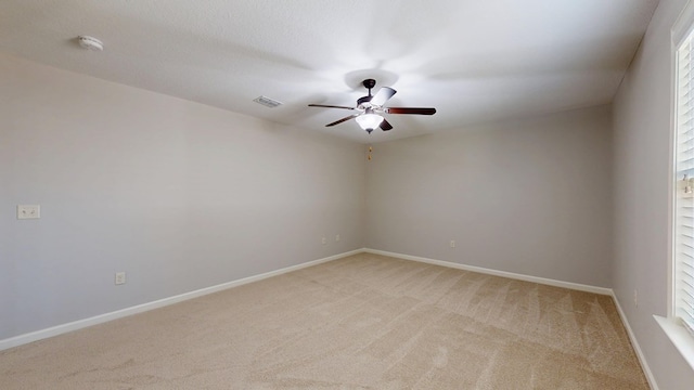 7315 San Vista Dr, Columbus, GA 31909 - spare room with a ceiling fan, light carpet, baseboards, and a smoke detector