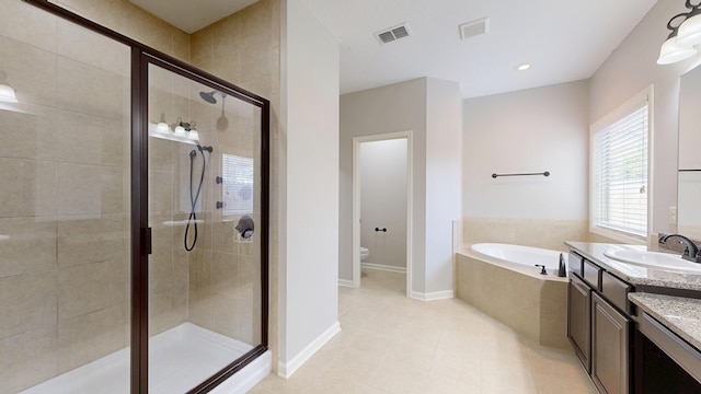 7315 San Vista Dr, Columbus, GA 31909 - full bath with a garden tub, a shower stall, toilet, tile patterned floors, and vanity