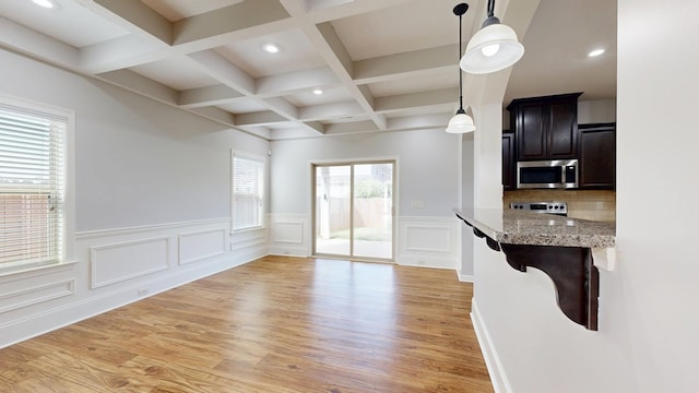 7315 San Vista Dr, Columbus, GA 31909 - kitchen featuring stainless steel appliances, beam ceiling, light wood-style floors, decorative light fixtures, and recessed lighting