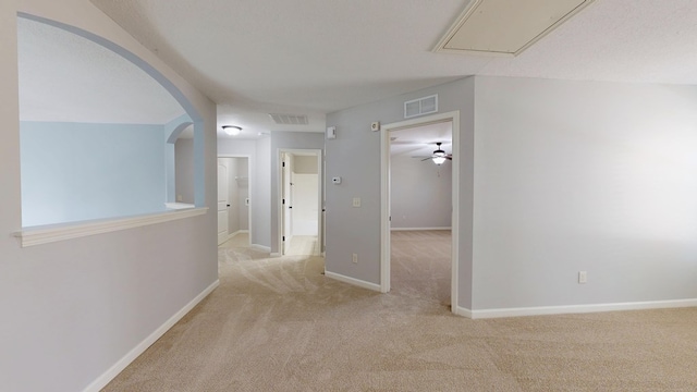 7315 San Vista Dr, Columbus, GA 31909 - hallway with carpet floors, attic access, arched walkways, and baseboards