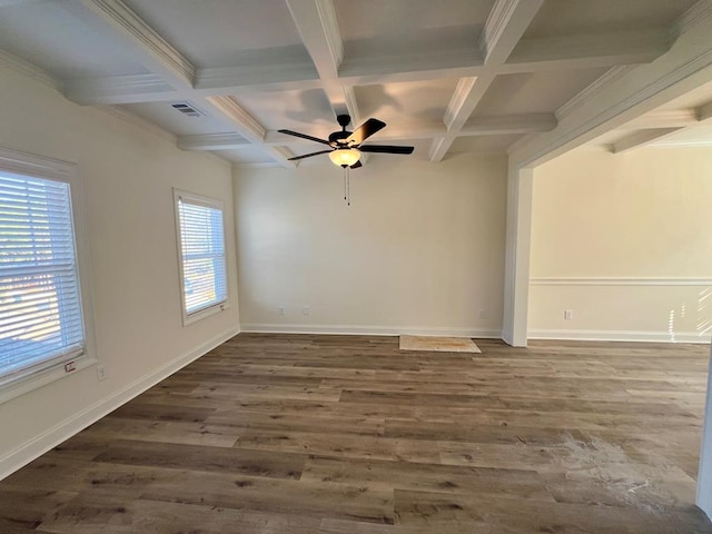 unfurnished room featuring hardwood / wood-style floors, beamed ceiling, ornamental molding, coffered ceiling, and ceiling fan