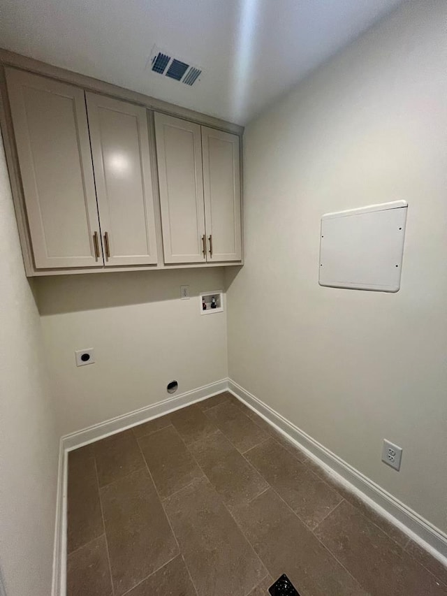 laundry area with washer hookup, cabinets, and hookup for an electric dryer