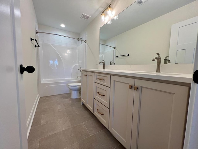 full bathroom featuring vanity, shower / bathing tub combination, and toilet