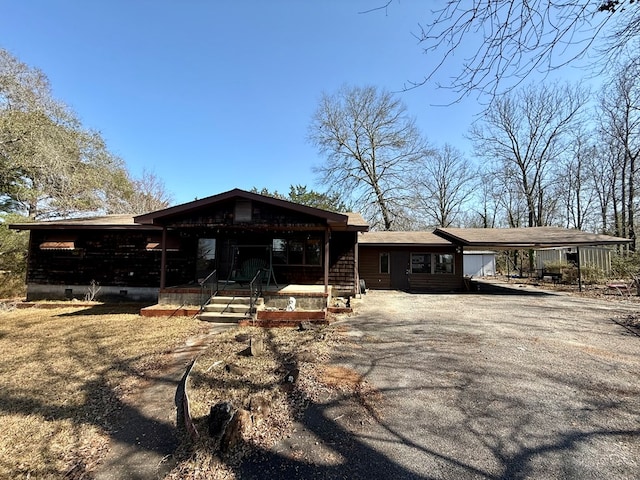 view of front facade featuring a carport