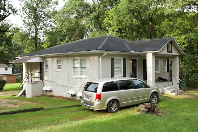 ranch-style house with a front yard