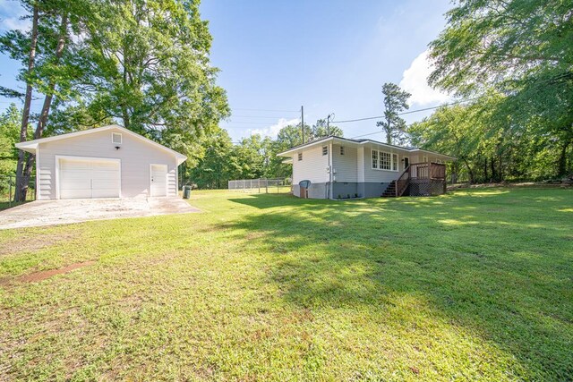 35 Dogwood St, West Point, GA 31833 - view of yard with a detached garage, an outdoor structure, stairs, and driveway