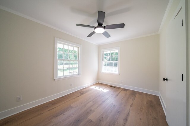35 Dogwood St, West Point, GA 31833 - empty room with baseboards, wood finished floors, crown molding, and ceiling fan