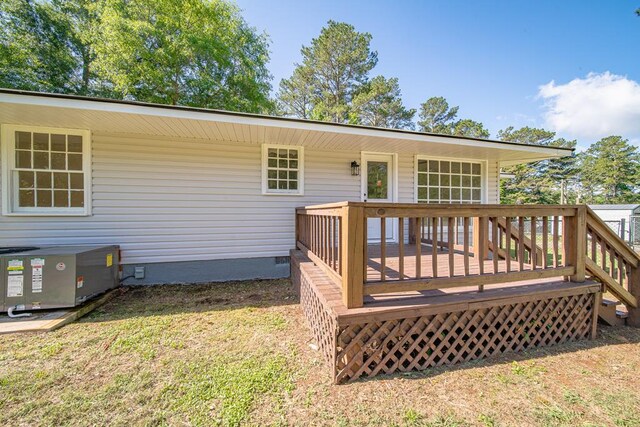 35 Dogwood St, West Point, GA 31833 - wooden deck featuring cooling unit and a yard