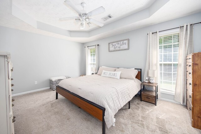 6 Lincolnshire Ln, Phenix City, AL 36870 - bedroom with carpet, a tray ceiling, baseboards, and ceiling fan