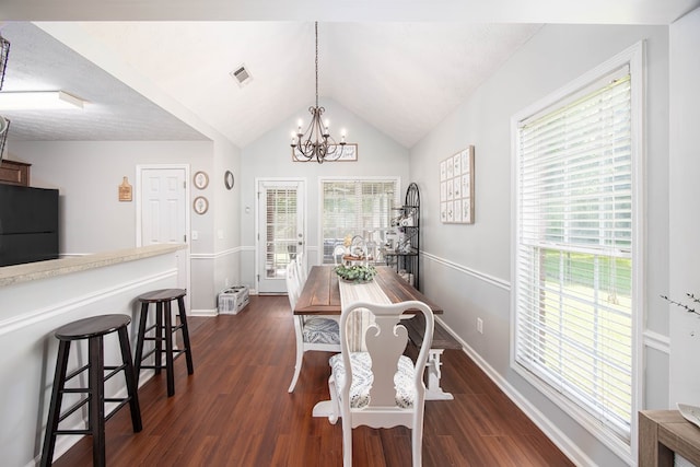 6 Lincolnshire Ln, Phenix City, AL 36870 - dining space with a chandelier, dark wood finished floors, baseboards, and lofted ceiling
