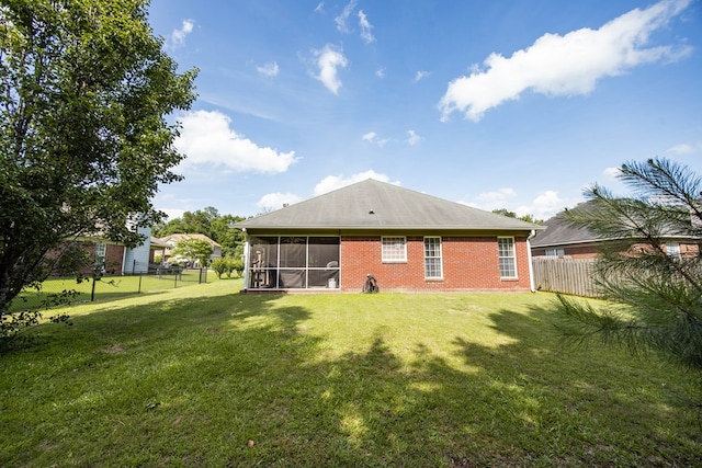 6 Lincolnshire Ln, Phenix City, AL 36870 - back of house featuring a sunroom and brick siding