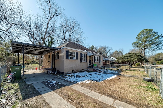 view of front of house with a carport