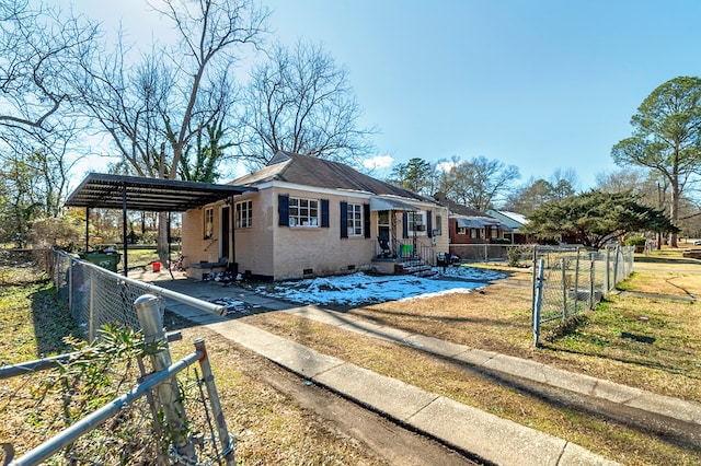 view of front of home with a carport