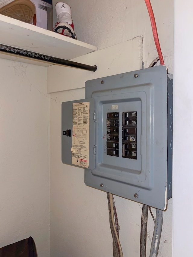 utility room featuring electric panel