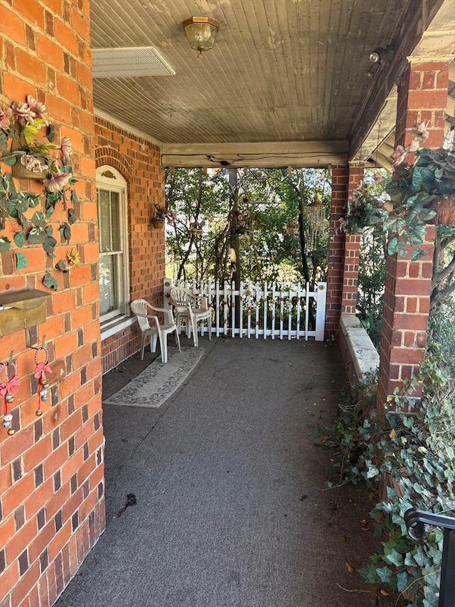 view of patio featuring covered porch