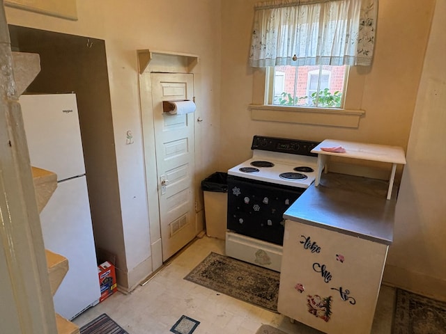 kitchen featuring white appliances