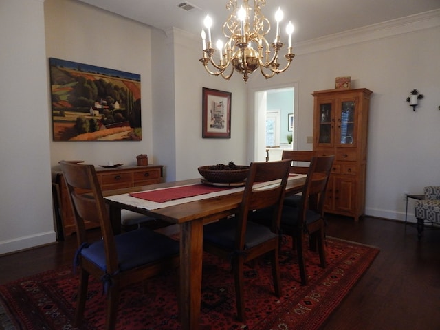 dining space with ornamental molding, dark wood-type flooring, visible vents, and baseboards