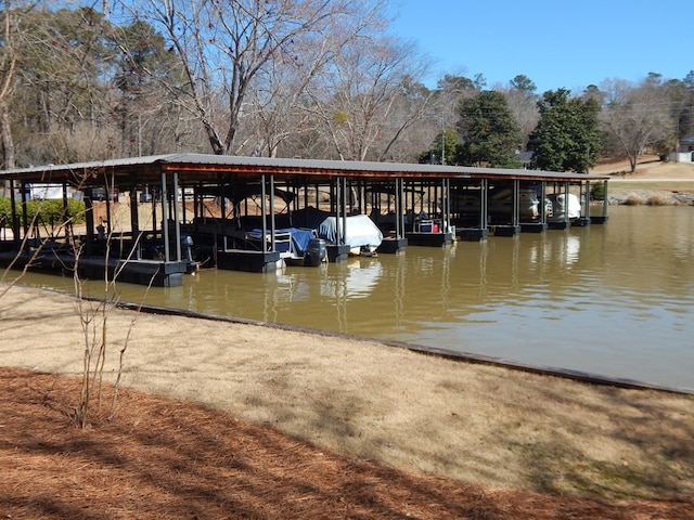 view of dock with a water view and boat lift