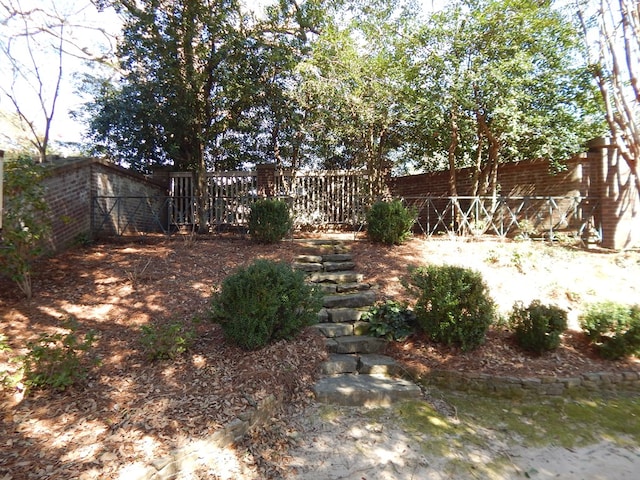 view of yard featuring fence