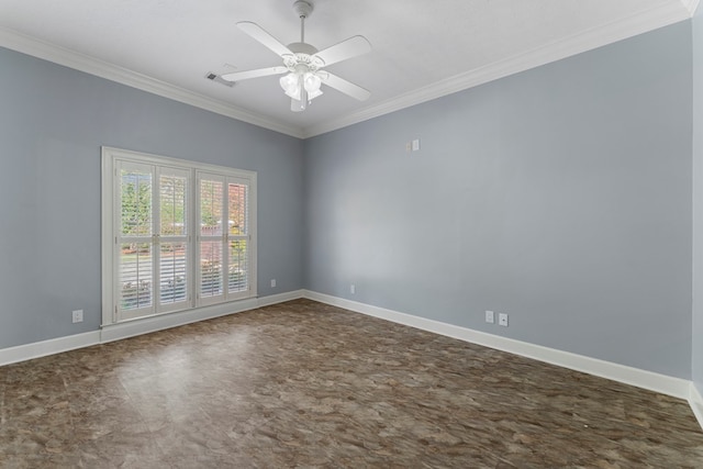 spare room featuring ornamental molding and ceiling fan