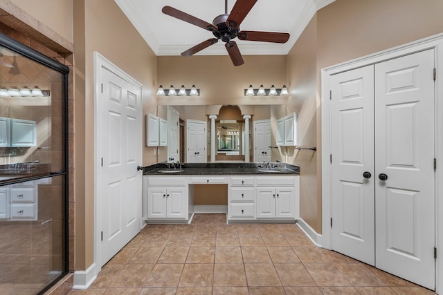 bathroom featuring vanity, an enclosed shower, ceiling fan, crown molding, and tile patterned floors