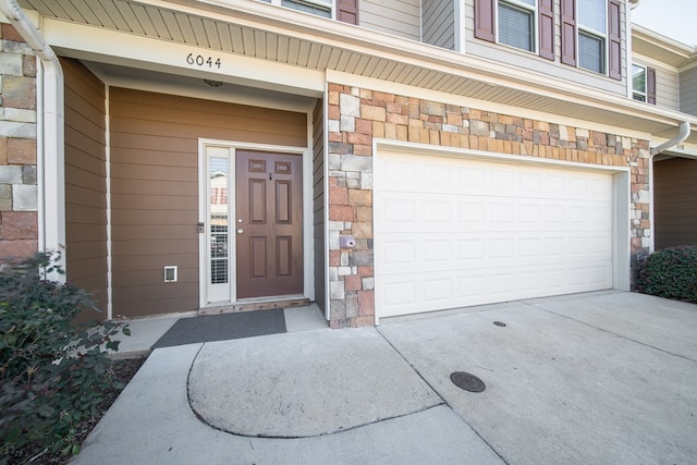 property entrance featuring a garage