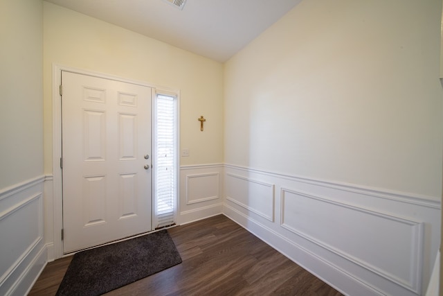 foyer entrance with dark wood-type flooring