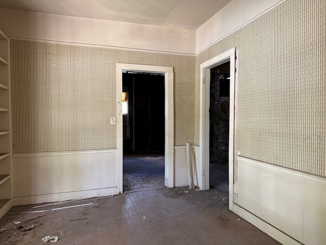 1509 12th St, Phenix City, AL 36867 - empty room with concrete flooring and wainscoting