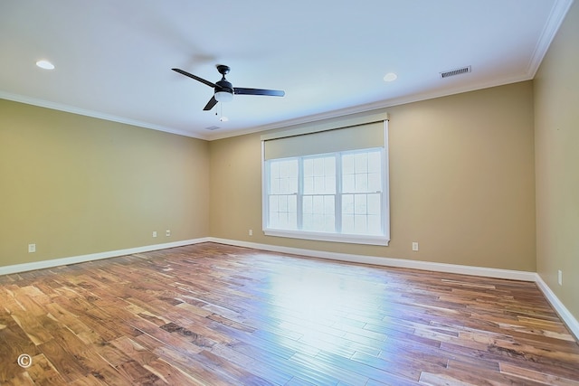 4701 Turnberry Ln Unit 12, Columbus, GA 31909 - spare room with crown molding, wood finished floors, ceiling fan, baseboards, and visible vents