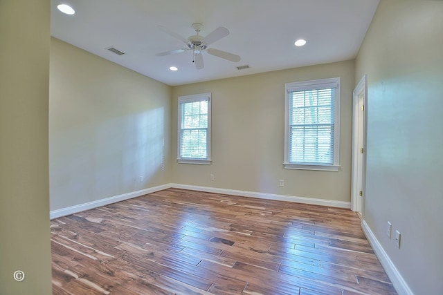 4701 Turnberry Ln Unit 12, Columbus, GA 31909 - empty room with baseboards, wood finished floors, visible vents, and ceiling fan