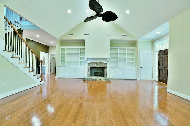 4701 Turnberry Ln Unit 12, Columbus, GA 31909 - unfurnished living room featuring light wood-style floors, visible vents, a ceiling fan, and built in features