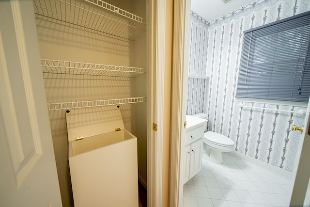 4854 Champions Way, Columbus, GA 31909 - bathroom with tile patterned flooring, wallpapered walls, and vanity