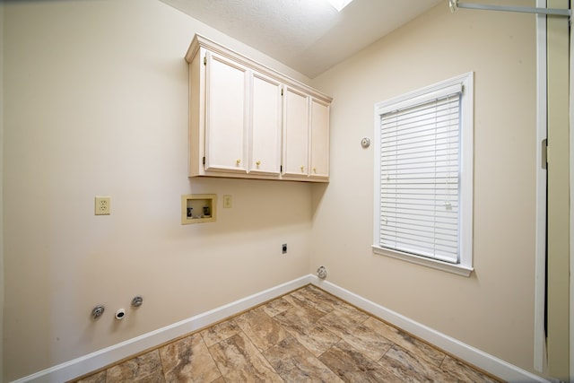 4854 Champions Way, Columbus, GA 31909 - laundry area with hookup for a gas dryer, electric dryer hookup, hookup for a washing machine, cabinet space, and stone finish flooring