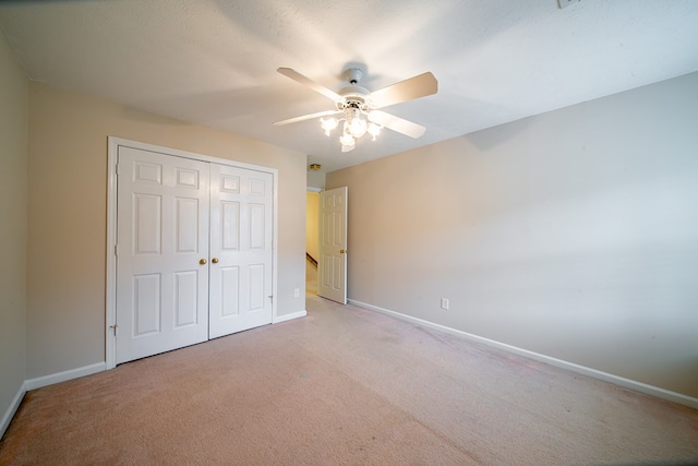 4854 Champions Way, Columbus, GA 31909 - unfurnished bedroom featuring light carpet, a closet, and ceiling fan